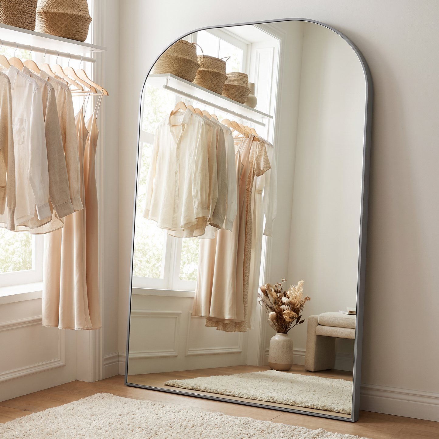 Silver arched stand full-length mirror in a dressing room