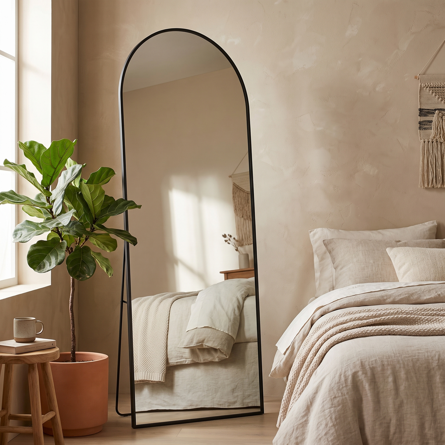 Silver arched stand full-length mirror in a modern bedroom