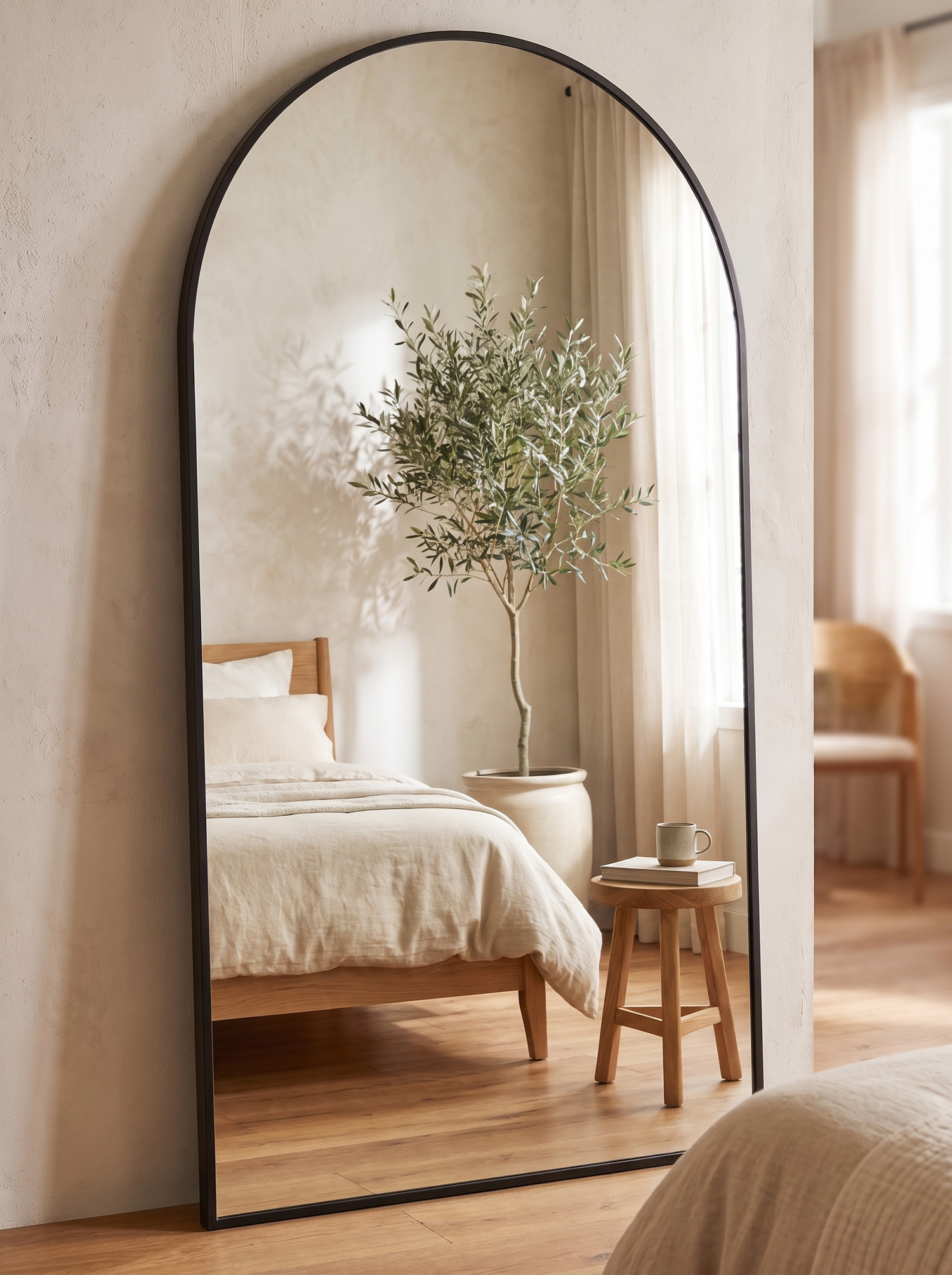 LuxAura Oversized Arch Mirror Black in a warm white interior slot 2