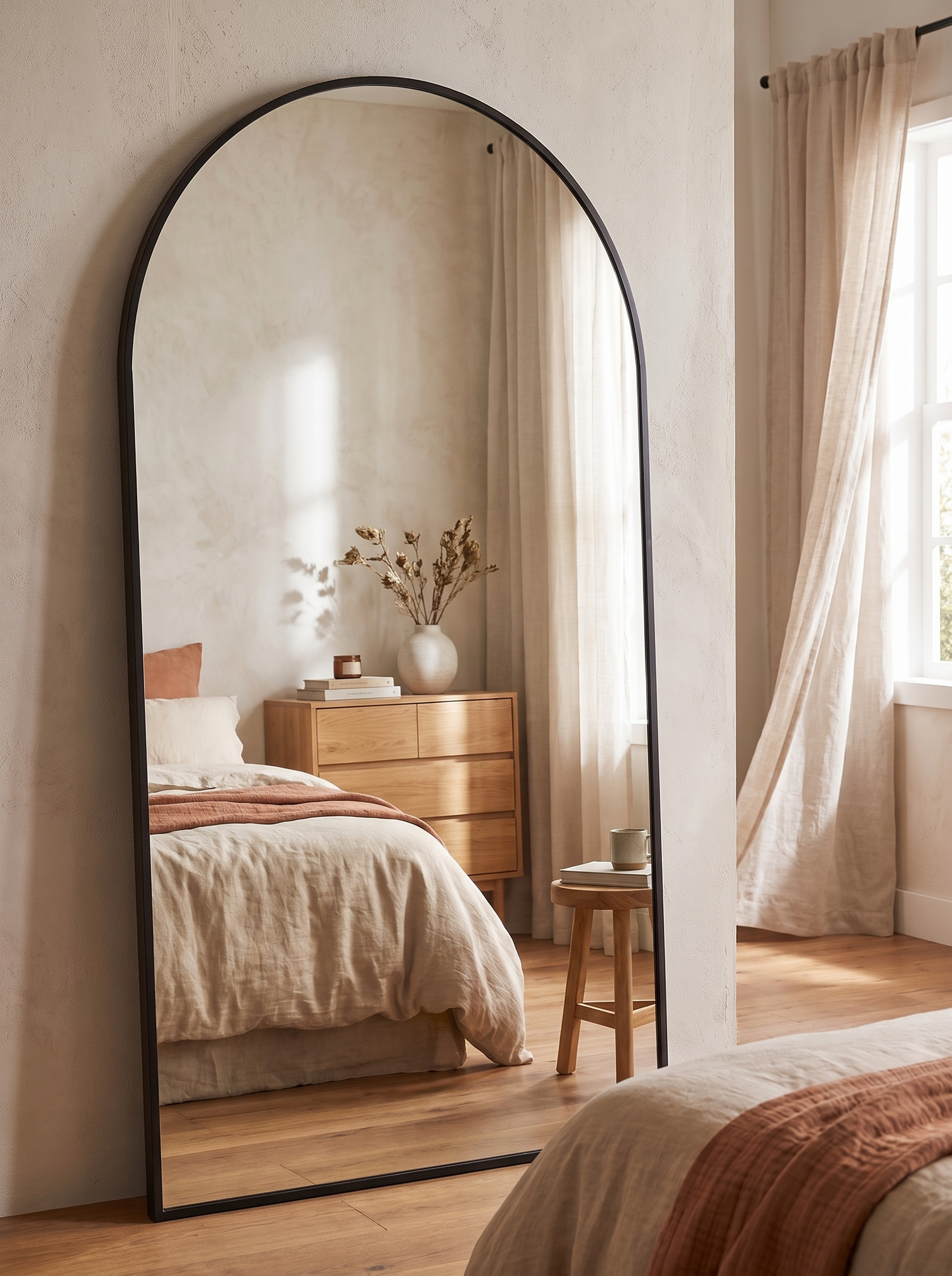 LuxAura Oversized Arch Mirror Black in a warm white interior slot 1