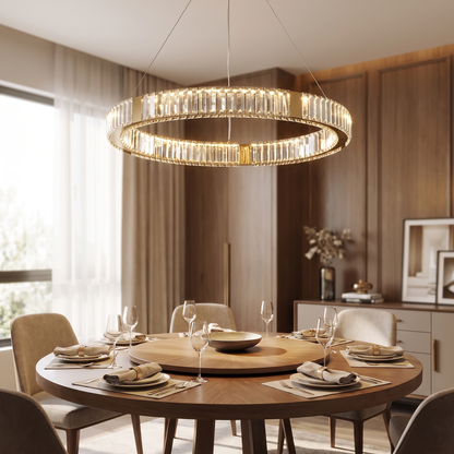 Style 1 chandelier lit above a round dining table