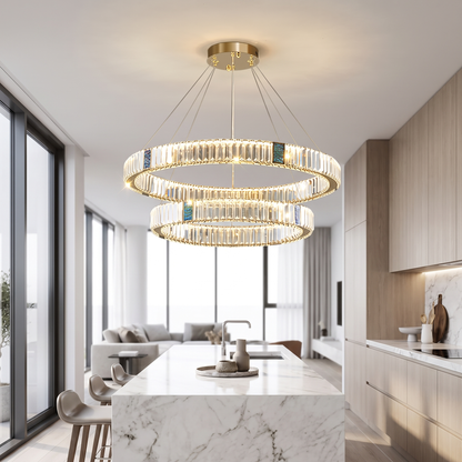 Luxury crystal chandelier above a kitchen island in daylight