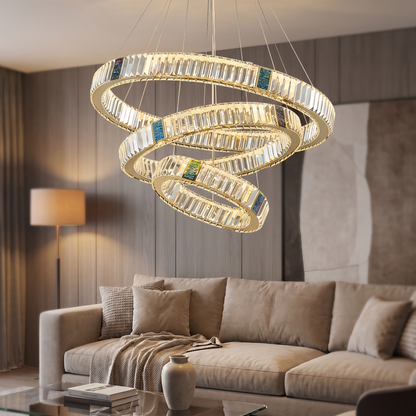 Luxury crystal chandelier in a contemporary living room at evening