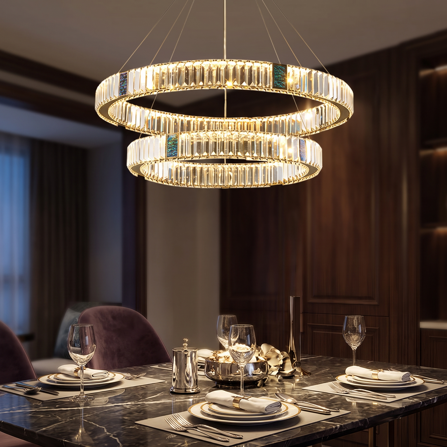 Style 5 chandelier lit above a dining table in the evening