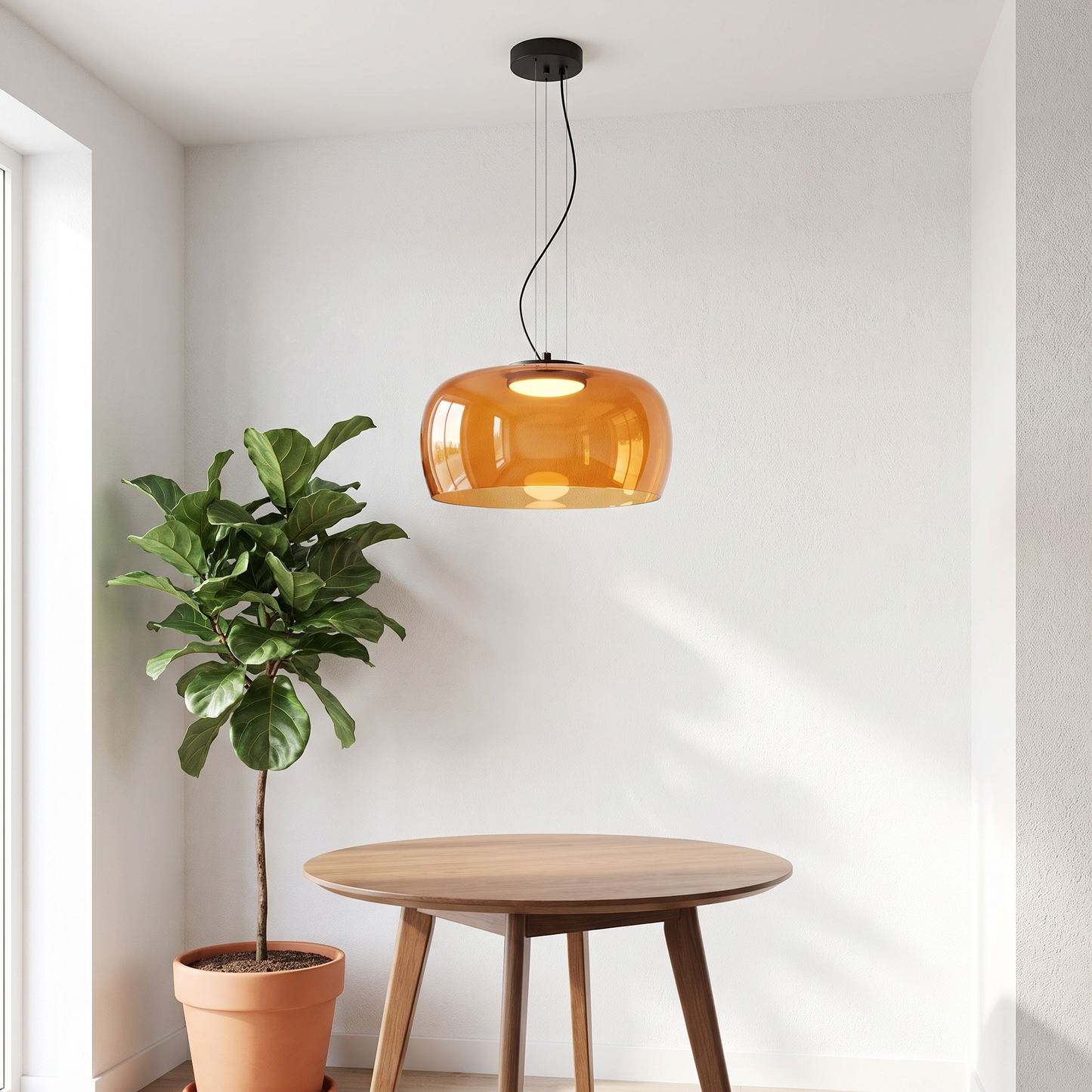 Nordic Glass Pendant Light in amber orange above a round dining table