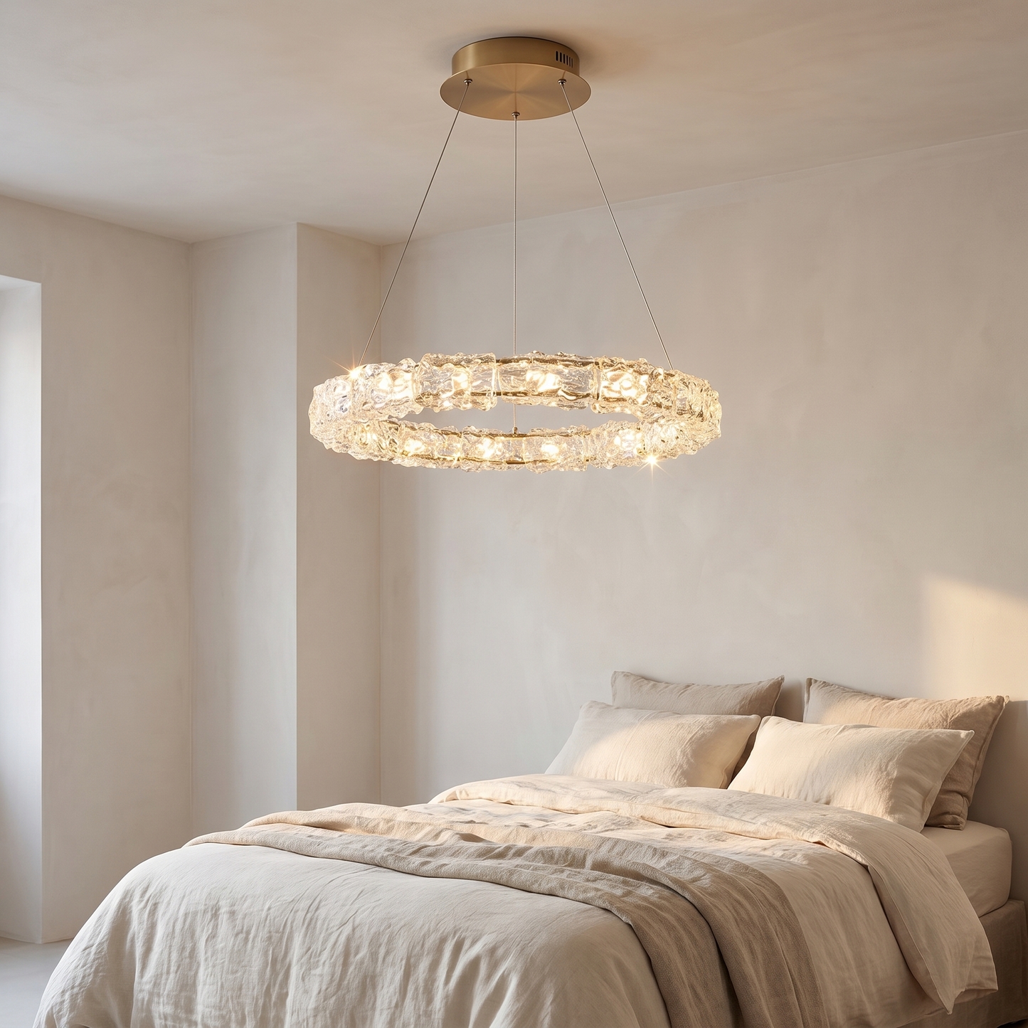 Crystal ring chandelier in a minimalist bedroom