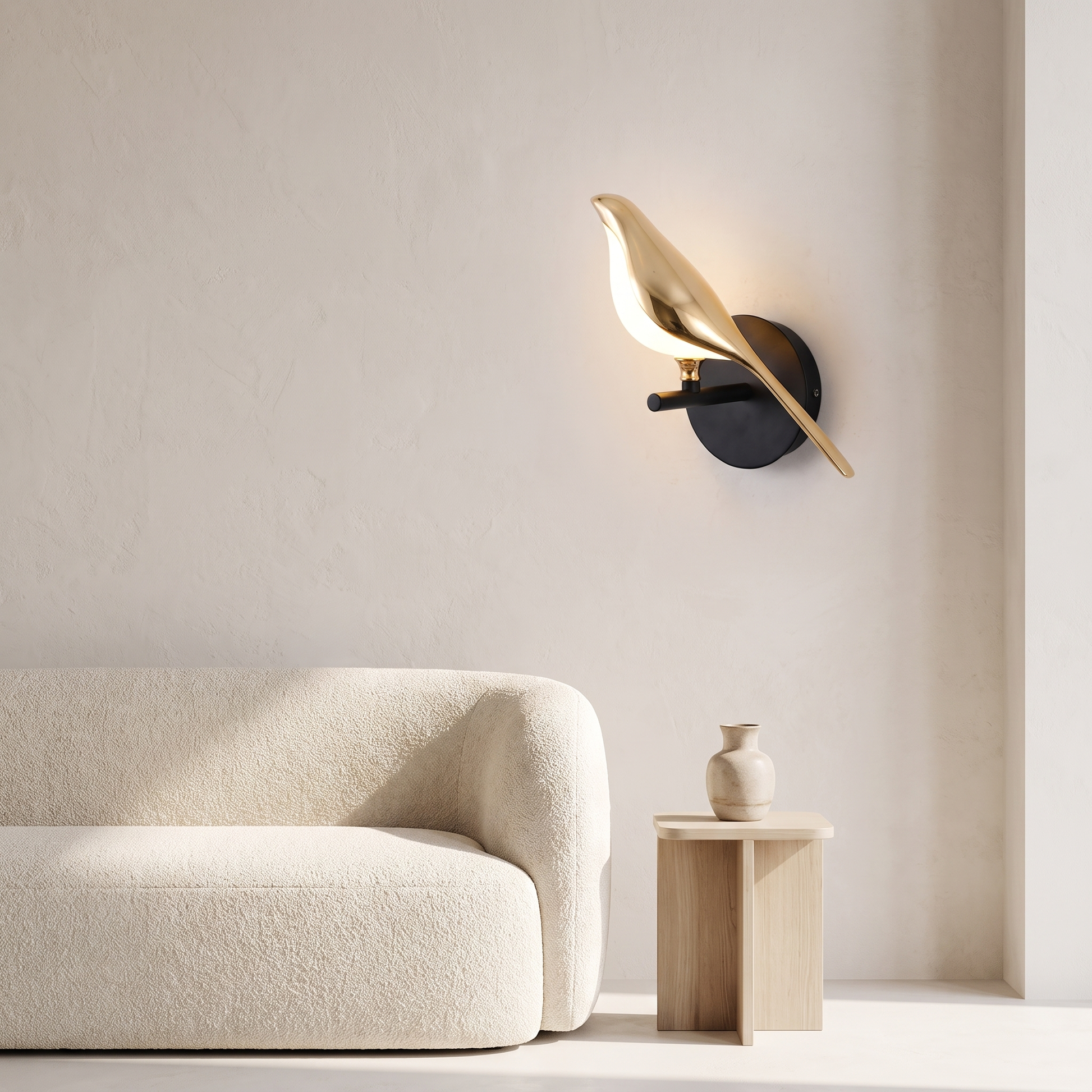 Metal bird shape LED wall sconce beside a living room sofa