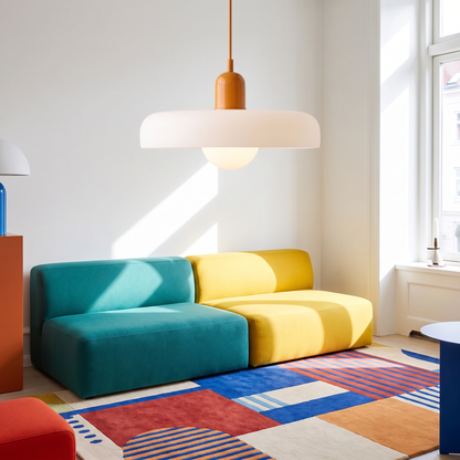 Memphis modern glass chandelier in orange in a modern living room