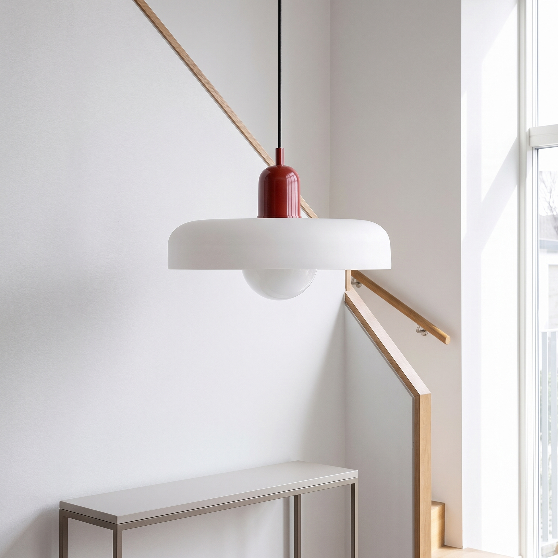 Memphis modern glass chandelier on a bright stairwell landing