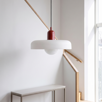 Memphis modern glass chandelier on a bright stairwell landing
