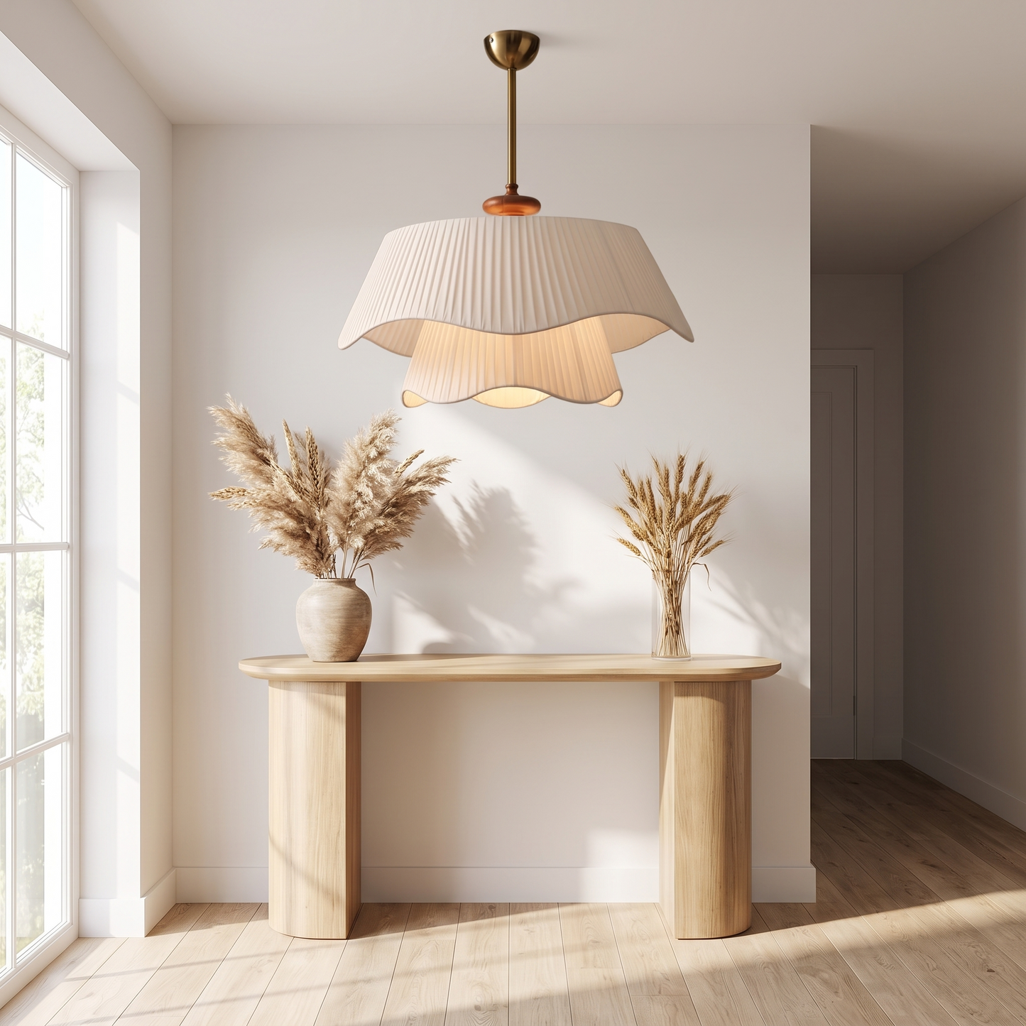 Cream style chandelier in a bright entryway