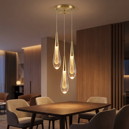 Postmodern crystal pendant light with warm light above a dining table
