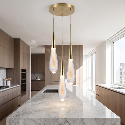 Postmodern crystal pendant light over a kitchen island