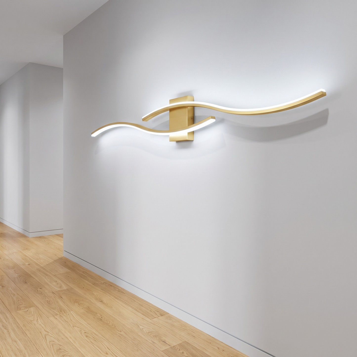 Gold LED wave wall sconce with cool white light in a hallway