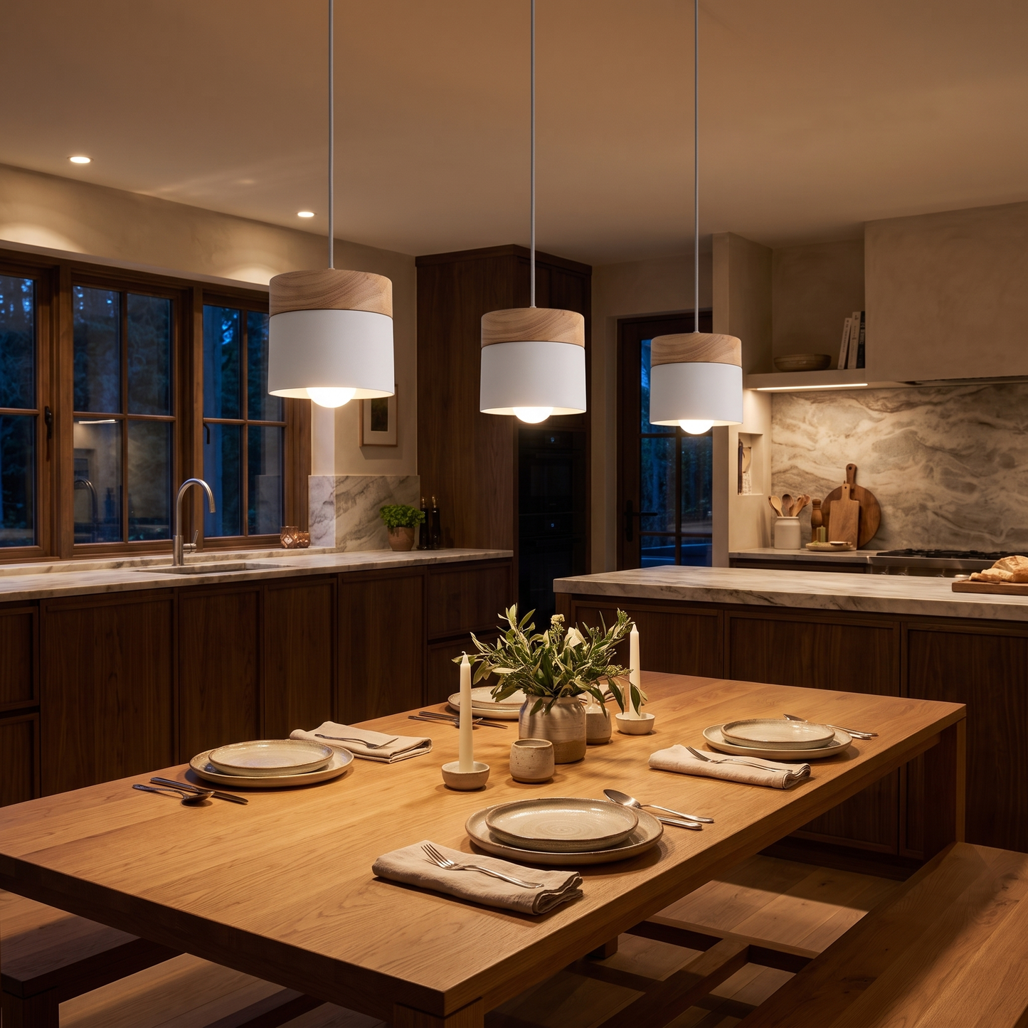Three solid wood pendant lights above a dining table