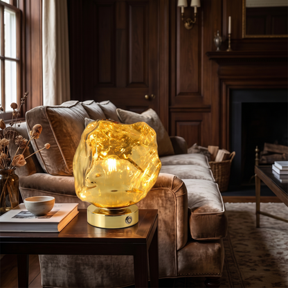 Gold lava stone glass table lamp on a side table