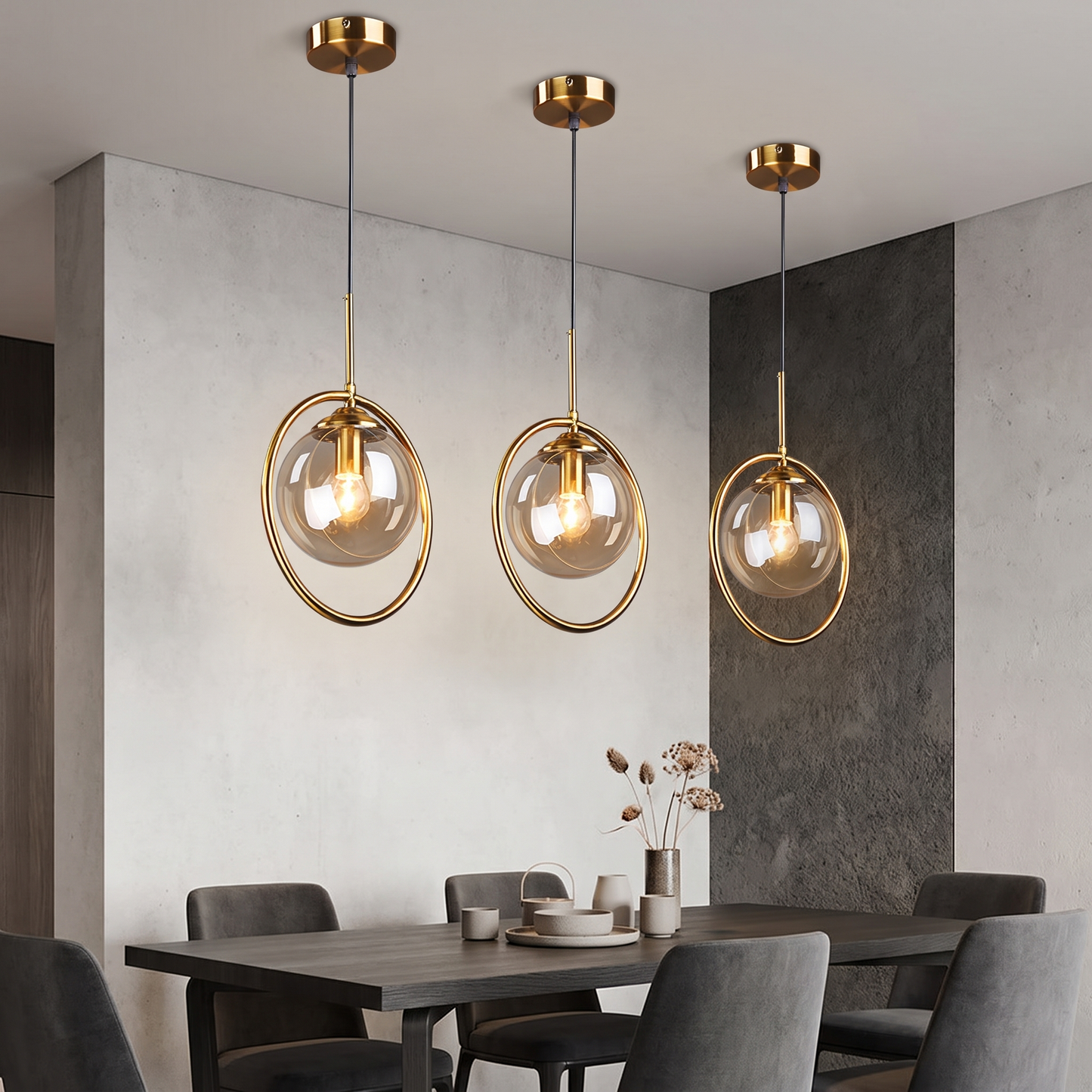 Smoke grey glass pendant light in a dining nook