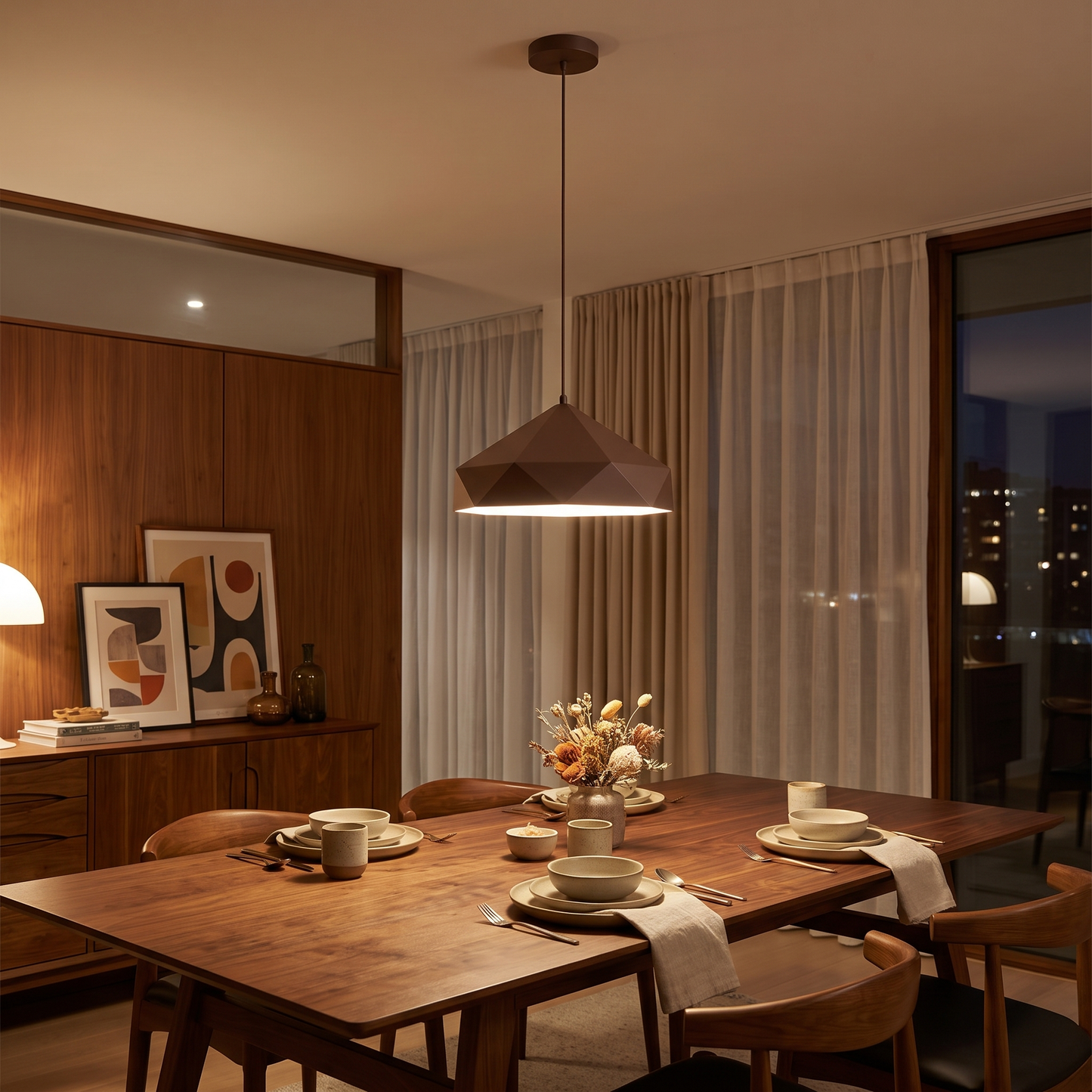Brown geometric LED pendant light above a walnut dining table