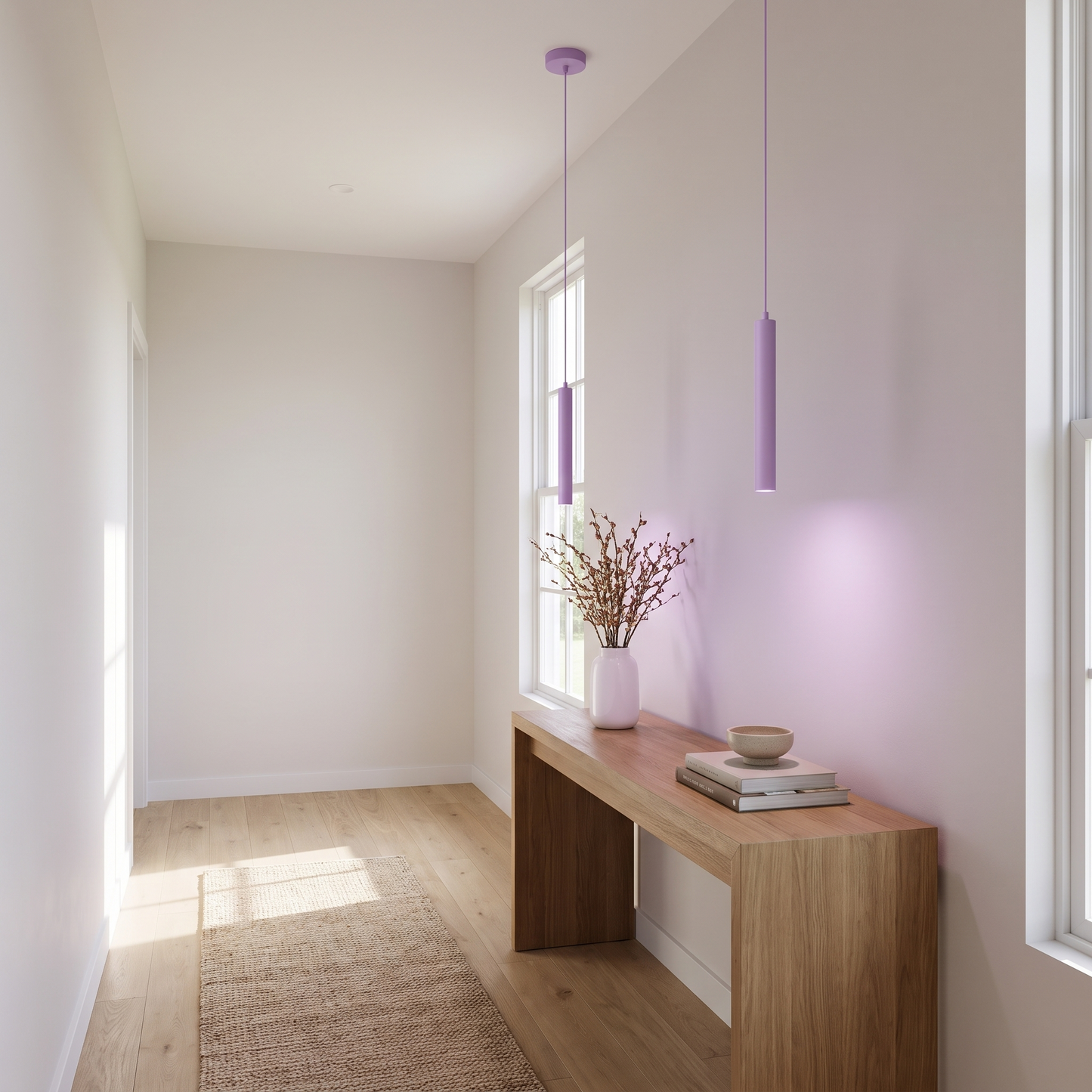 Violet geometric LED pendant light above a hallway console
