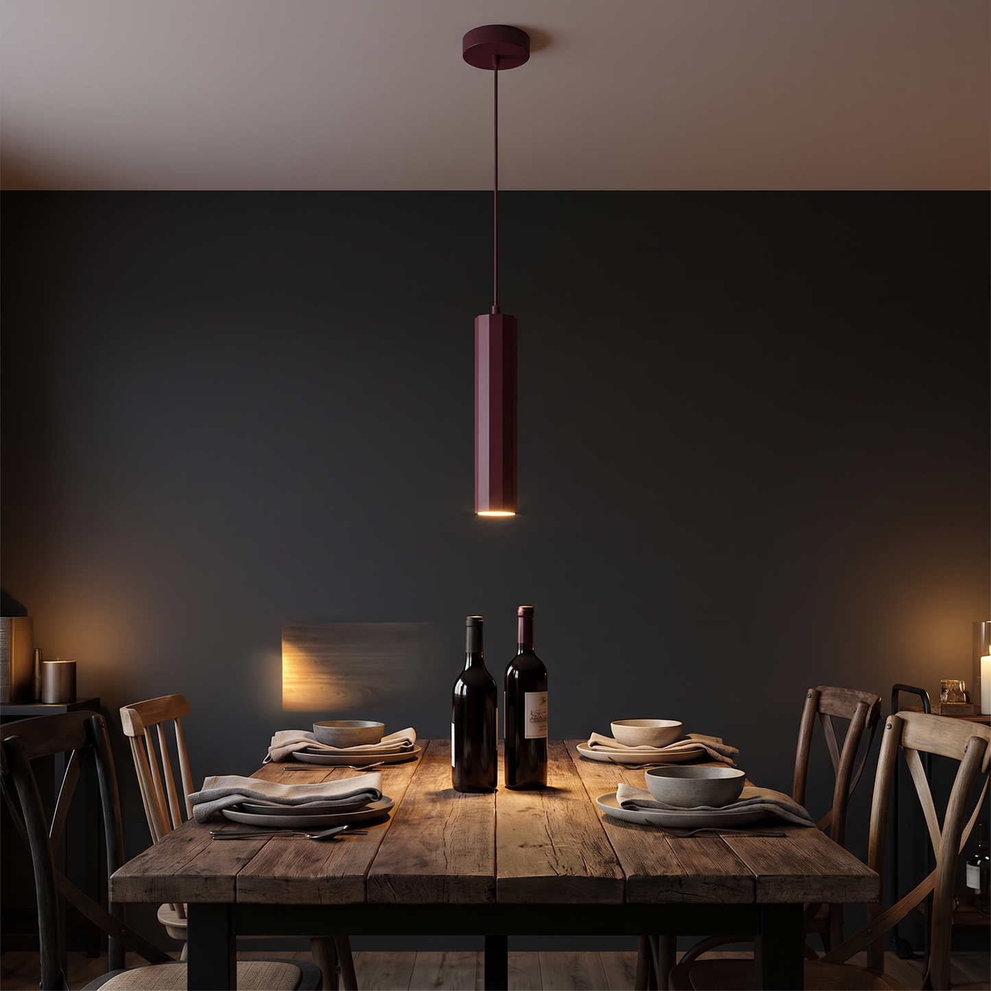 Burgundy geometric LED pendant light in a moody dining room