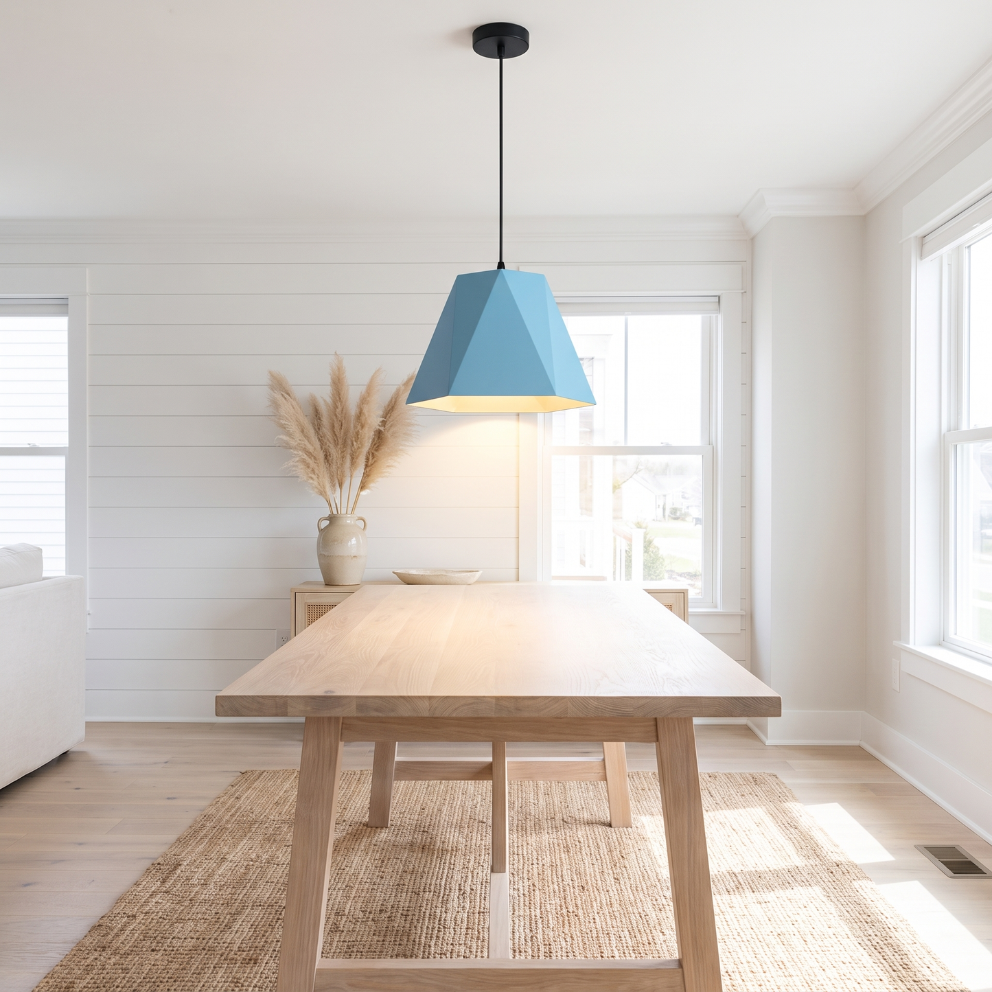 Sky blue geometric LED pendant light in a coastal-style room