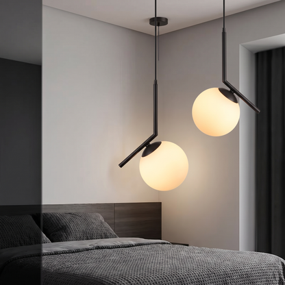 Copper black bedroom pendant light in a contemporary bedroom