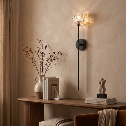 Balle clear crystal wall sconce in an elegant living room