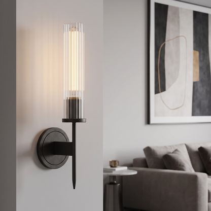 Iron single head Amorra crystal wall sconce in a living room