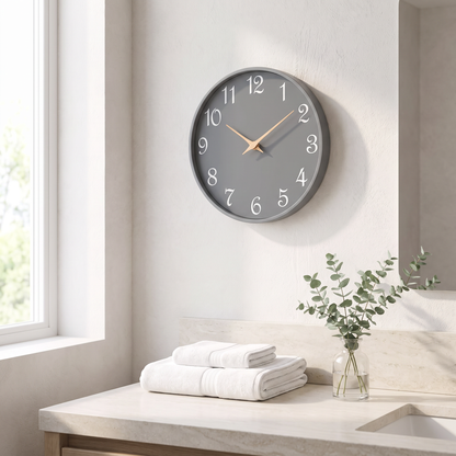 Gray 8 inch wall clock in a bathroom above a stone vanity