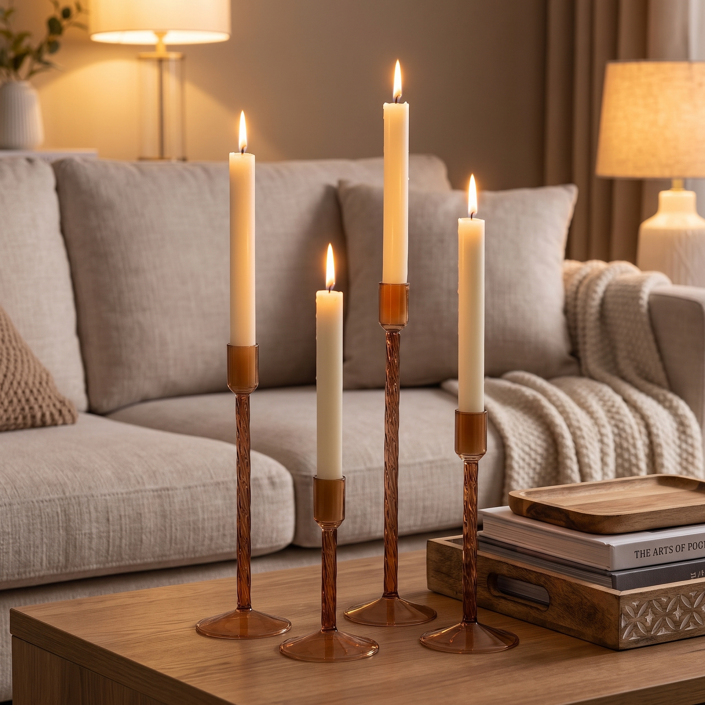 Brown glass taper candle holders on a living room coffee table