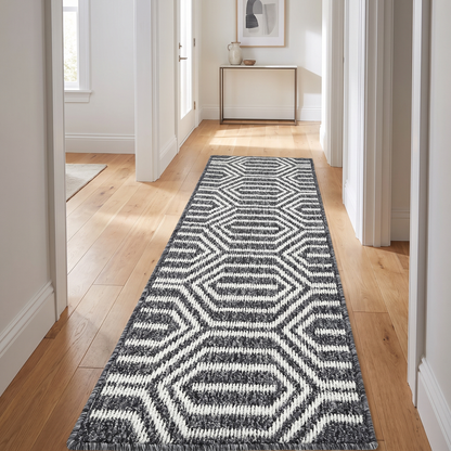 Black runner rug down a hallway