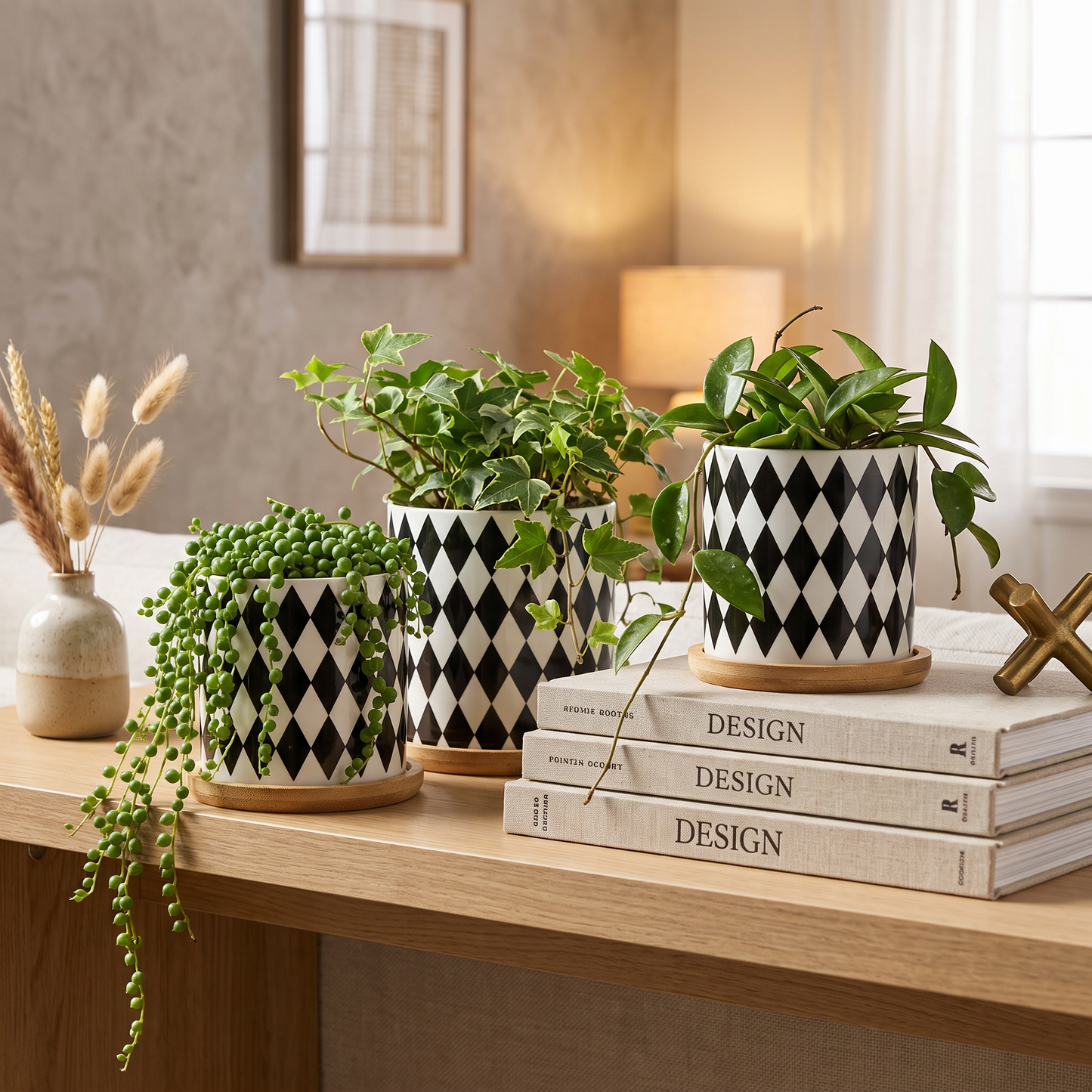 Black and white planters on a living room console table