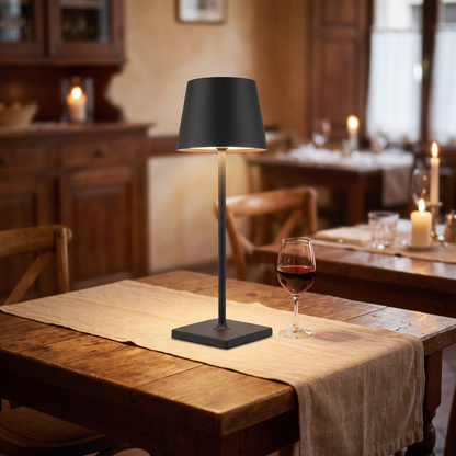 Black cordless table lamp on a restaurant table