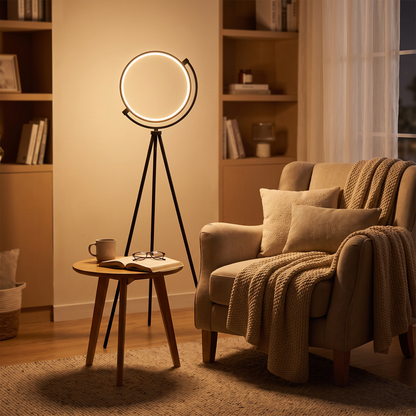 Ring tripod floor lamp in a reading corner at night