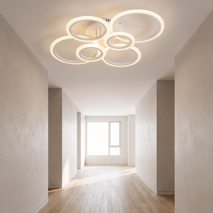 Six-ring LED ceiling light in a bright hallway