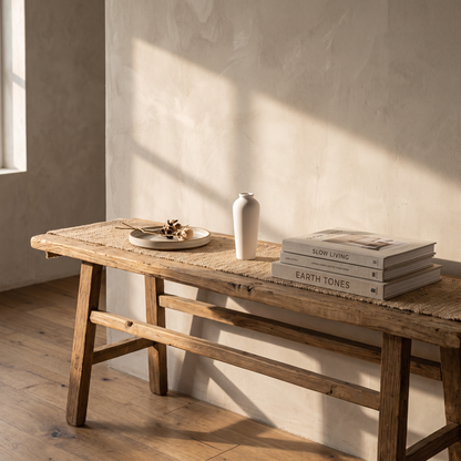 Minimalist ceramic vase on a hallway console