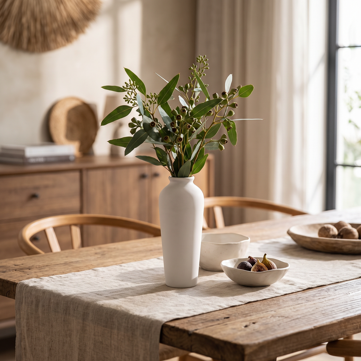 Minimalist ceramic vase on a dining table