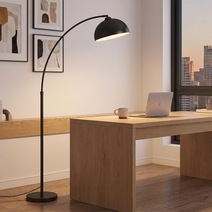 Scandinavian arc floor lamp over a home office desk