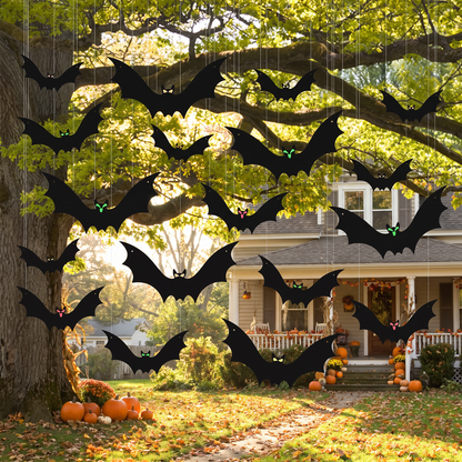 Hanging bat decorations in a tree
