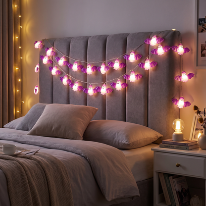 Bat string lights on a bed headboard