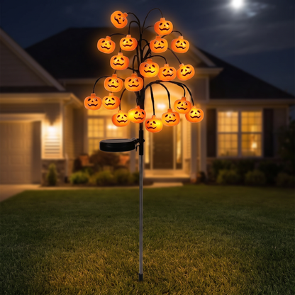 Pumpkin Branch Lamp Warm 20L on a front lawn at night